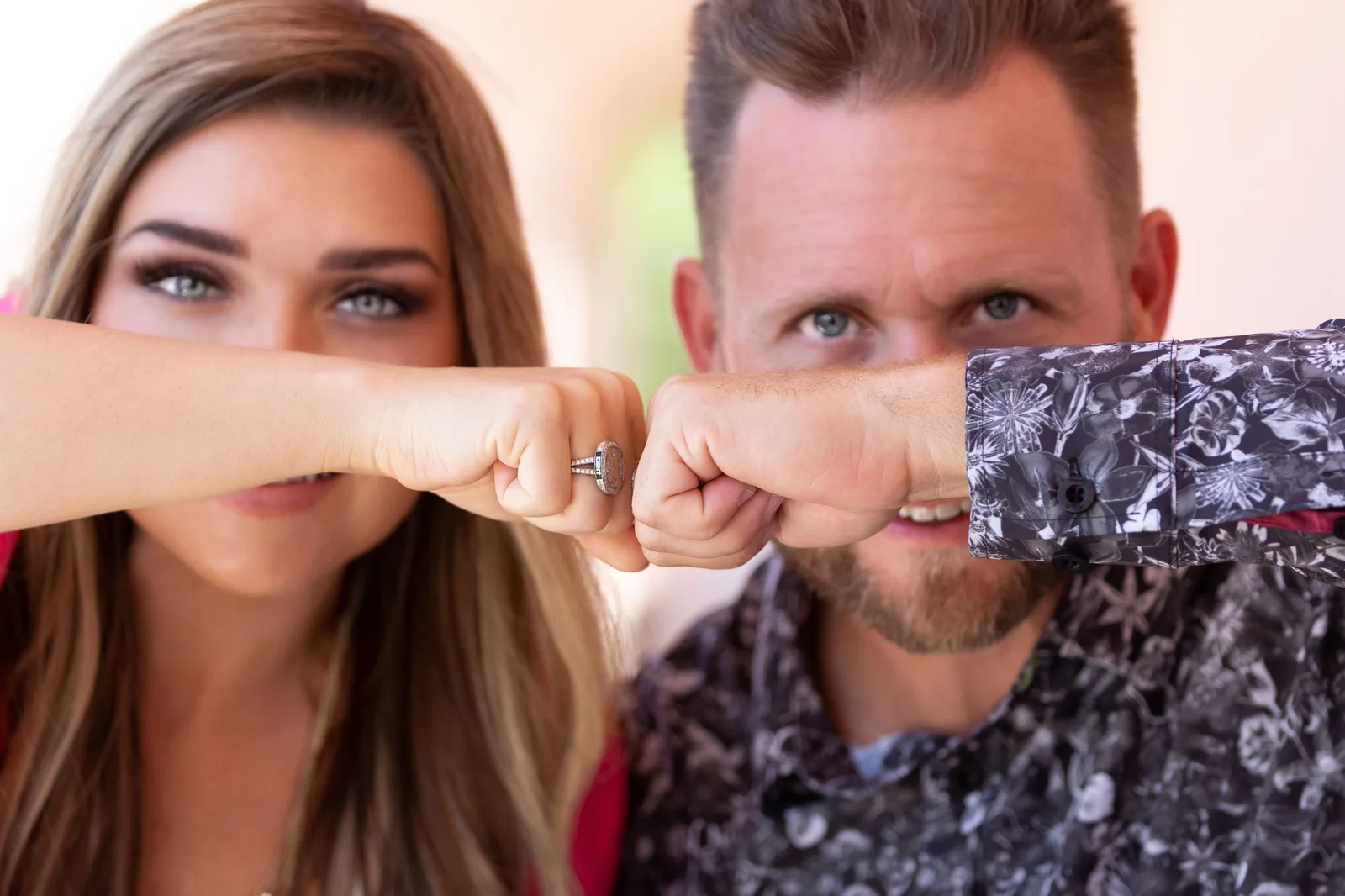 Stephanie and Bryan Dulaney bumping fists